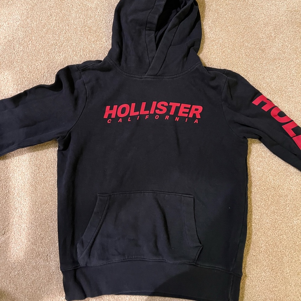 Hollister boys xs black hoodie with red writing, great condition